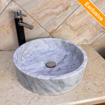 white marble round stone sink